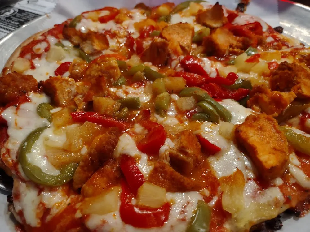 Hawaiian and Buffalo Chicken Pizza